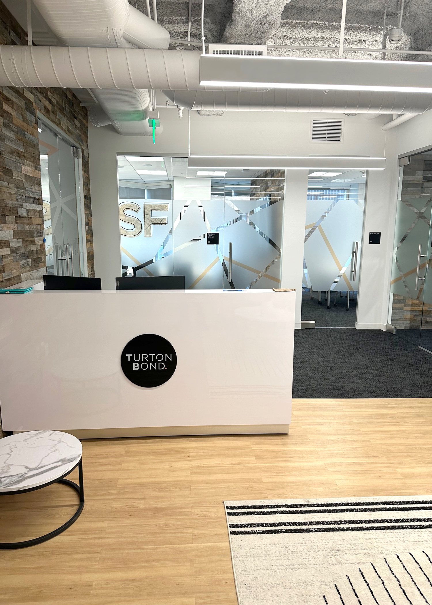 One benefit you'll get from prining on frosted window film: cool graphics that still allow for light transmission.