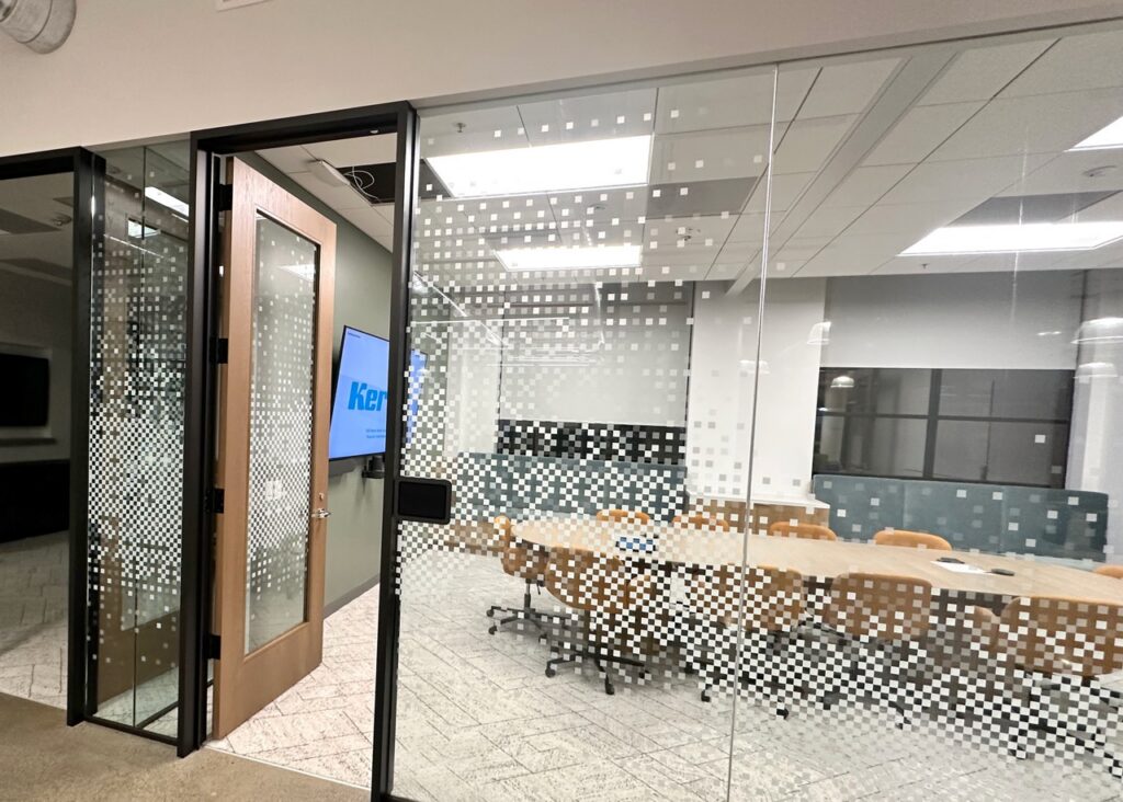 The custom graphic design unifies the office space.