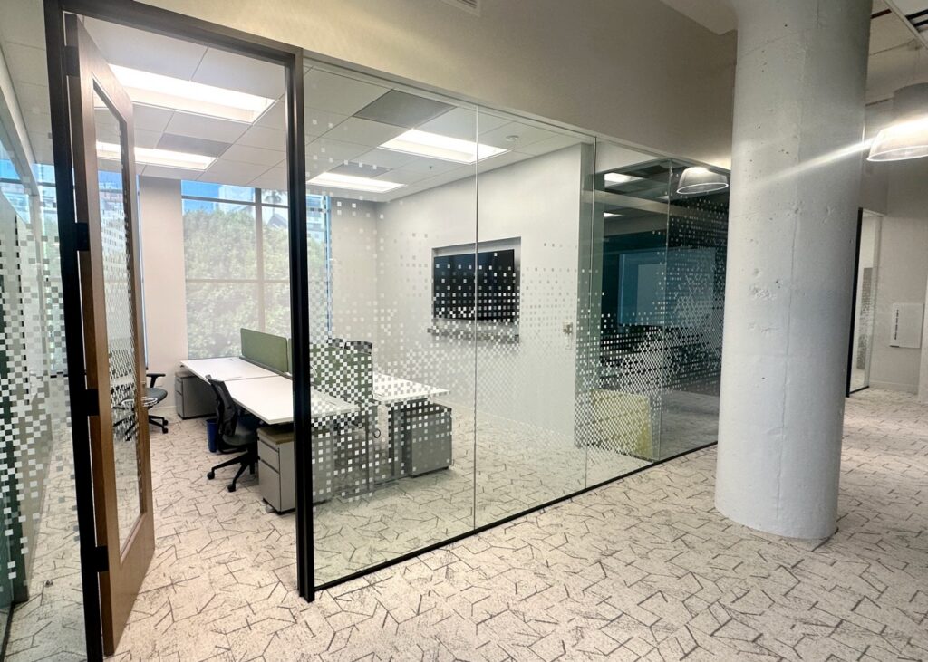 The pixelated design adds visual interest throughout the office.