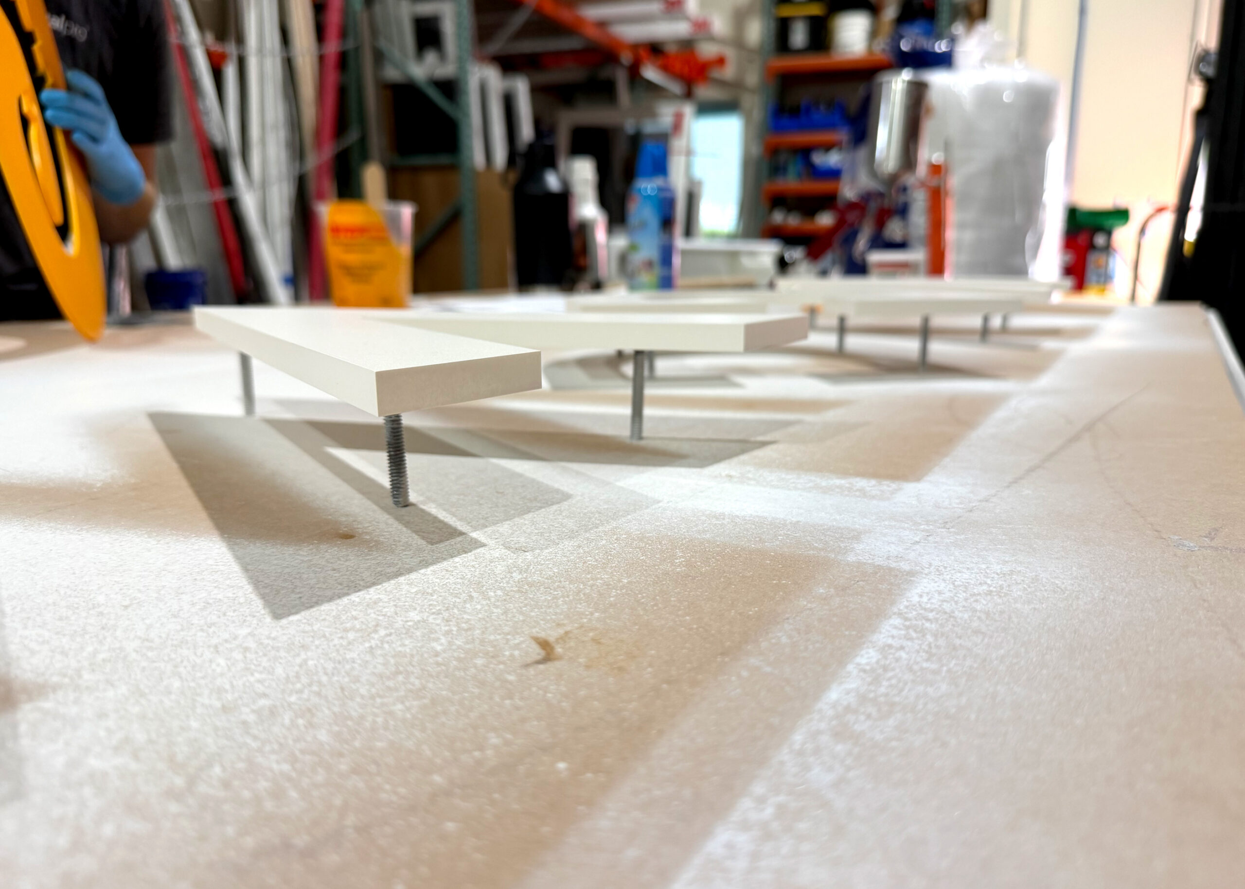 Standoff acrylic logo signage fabricated in-house by the VisualPro team.