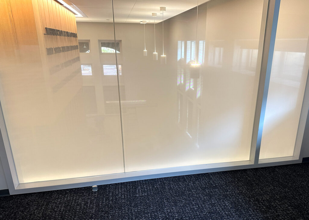 Custom gradient window film, designed and installed by VisualPro.